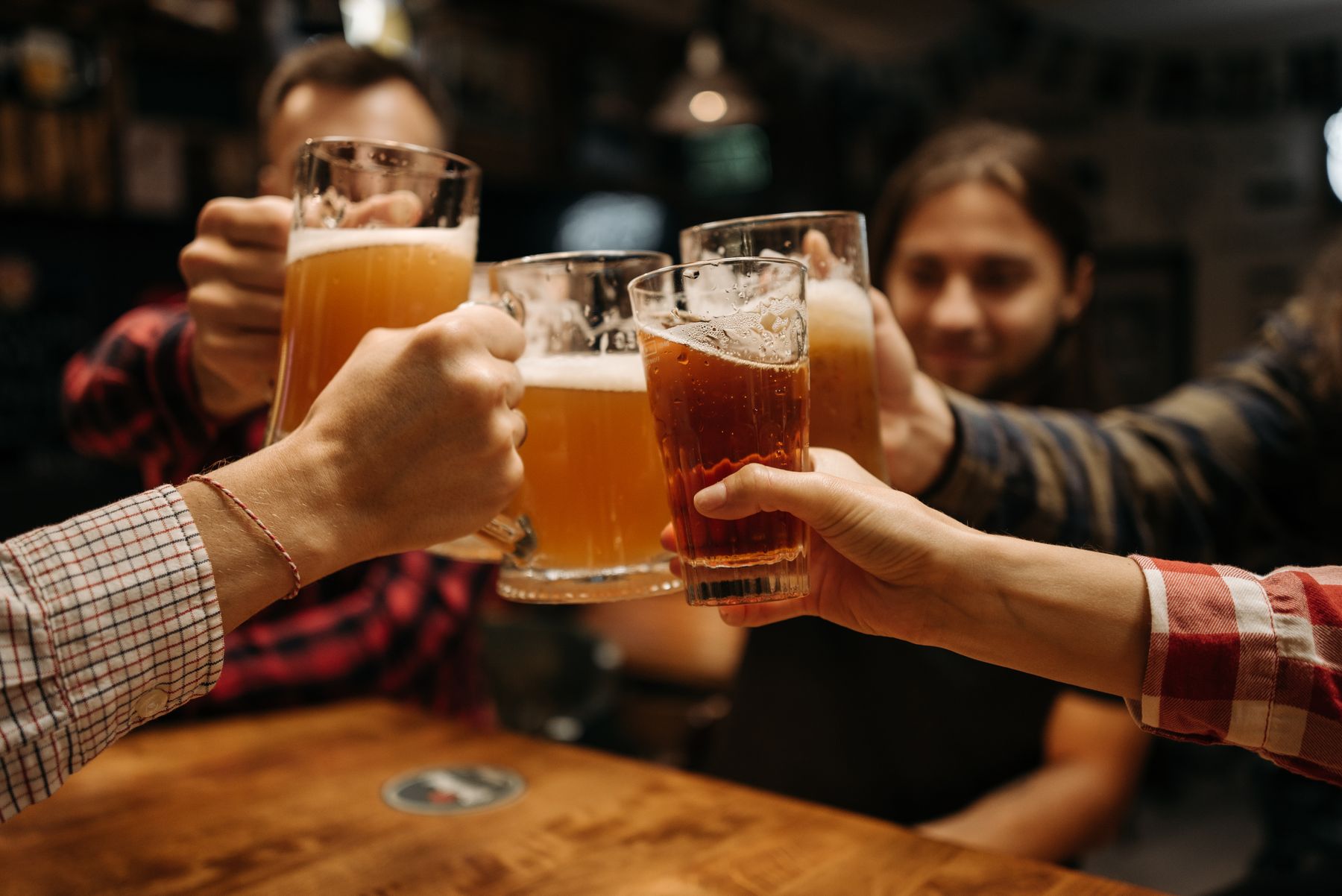 Stag lads drinking beer pub night out