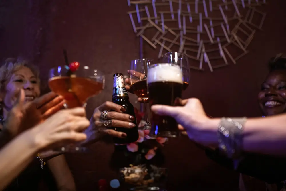 Friends toasting drinks bar planning